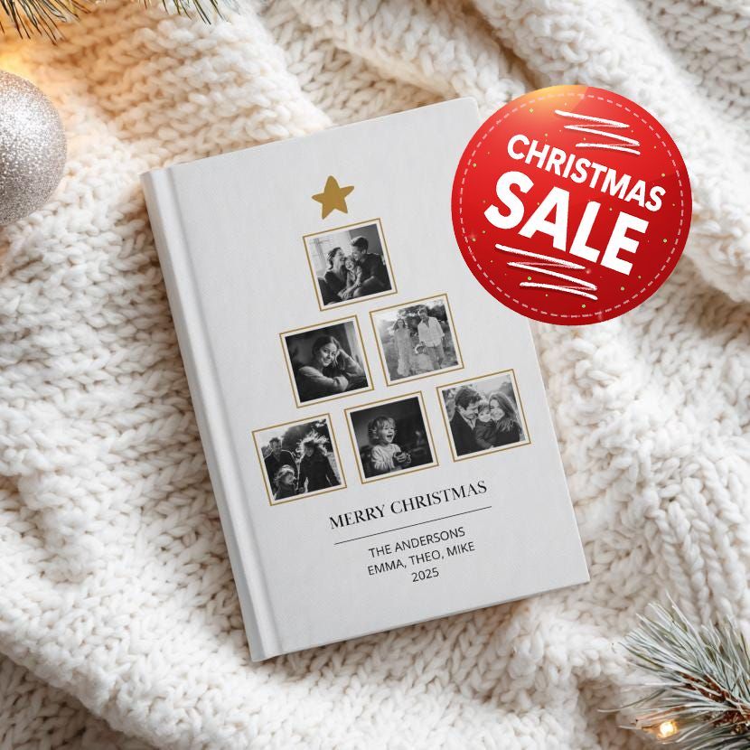 A row of books with pictures on them are sitting on a table.