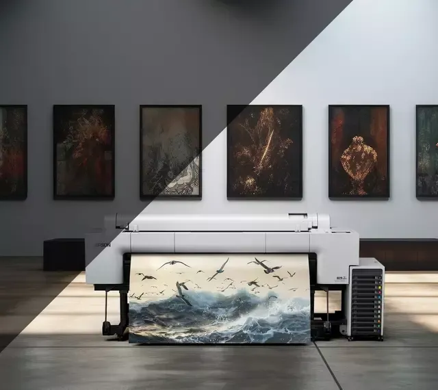 An aerial view of a rocky shoreline with waves crashing on it.