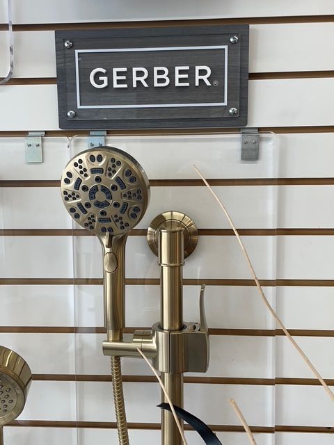 A shower head with a sign that says gerber on it
