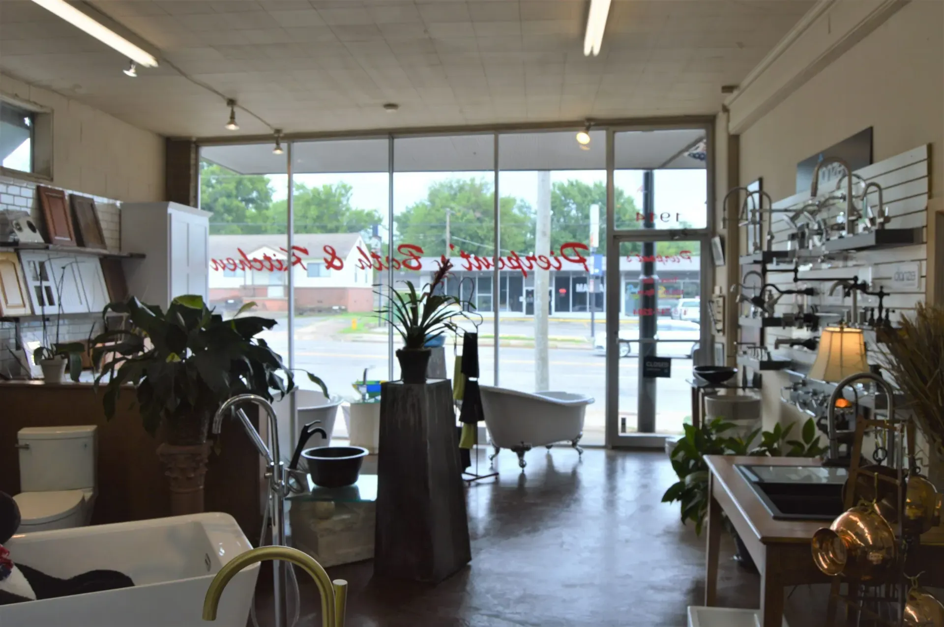 A bathroom store with a bathtub and a sink