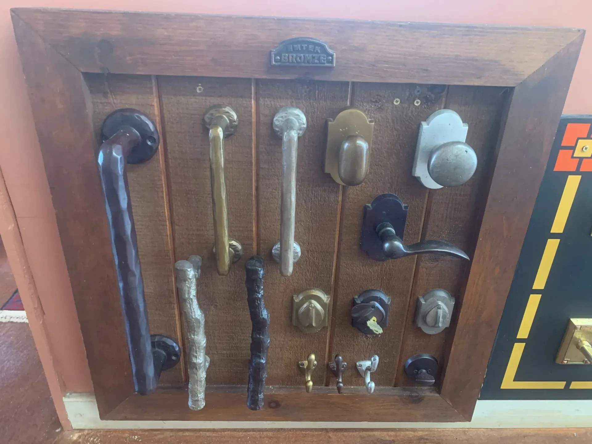 A display of different types of door handles and knobs