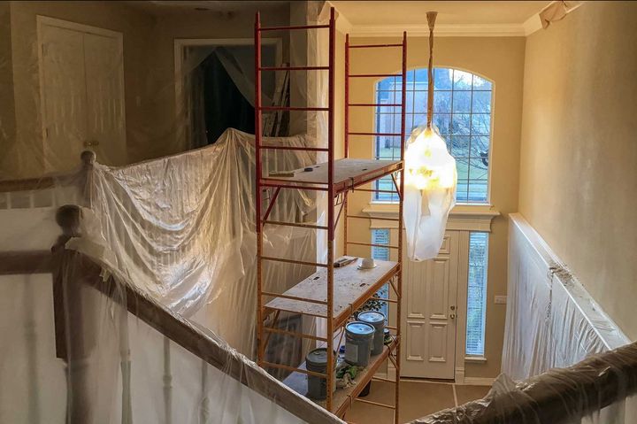 Two story residential home interior renovation work under construction. 