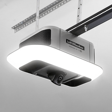 LiftMaster garage door opener with integrated camera and LED light. Mounted on a ceiling.
