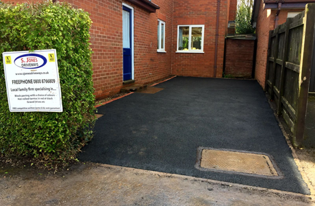 New driveway on the backyard of the house
