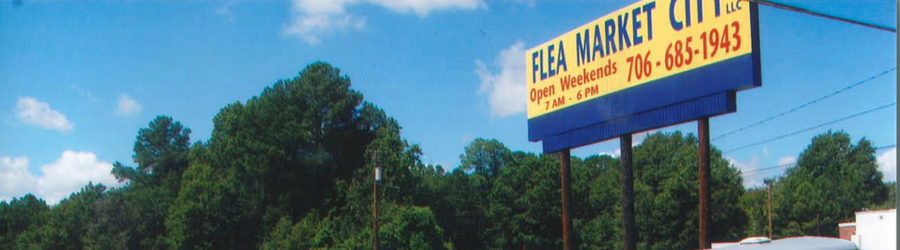 A yellow and blue sign for 