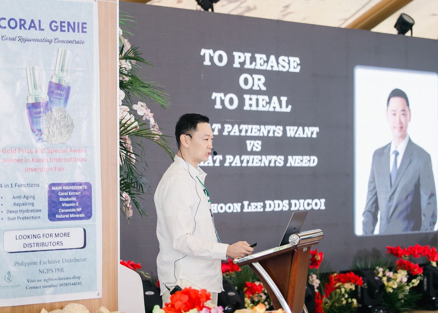 A large waiting room with a reception desk and a couch.