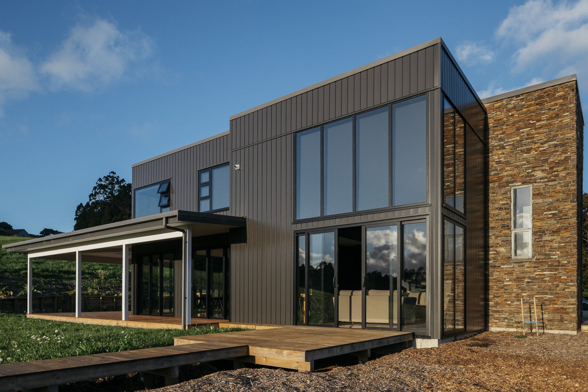 Black Coloursteel and Schist Cladding