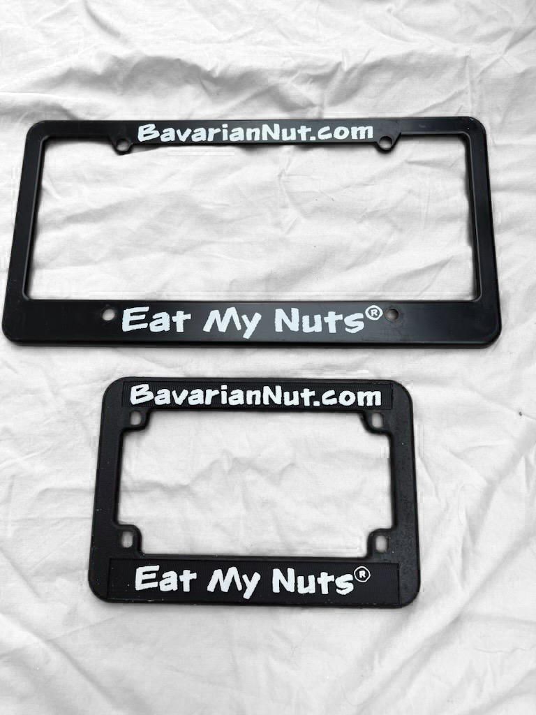 A car black plate holder with with Eat My Nuts print