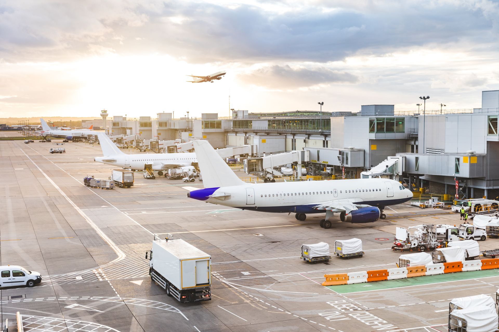 A large passenger jet is parked on the tarmac at an airport.