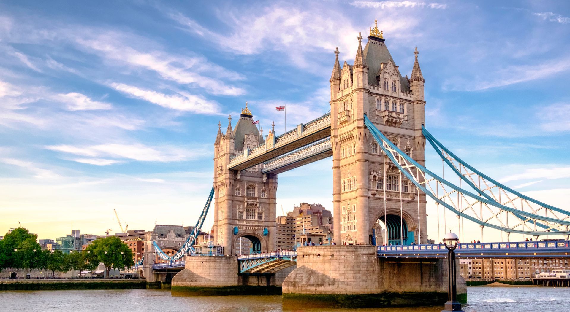 The tower bridge is a suspension bridge over a river in london.