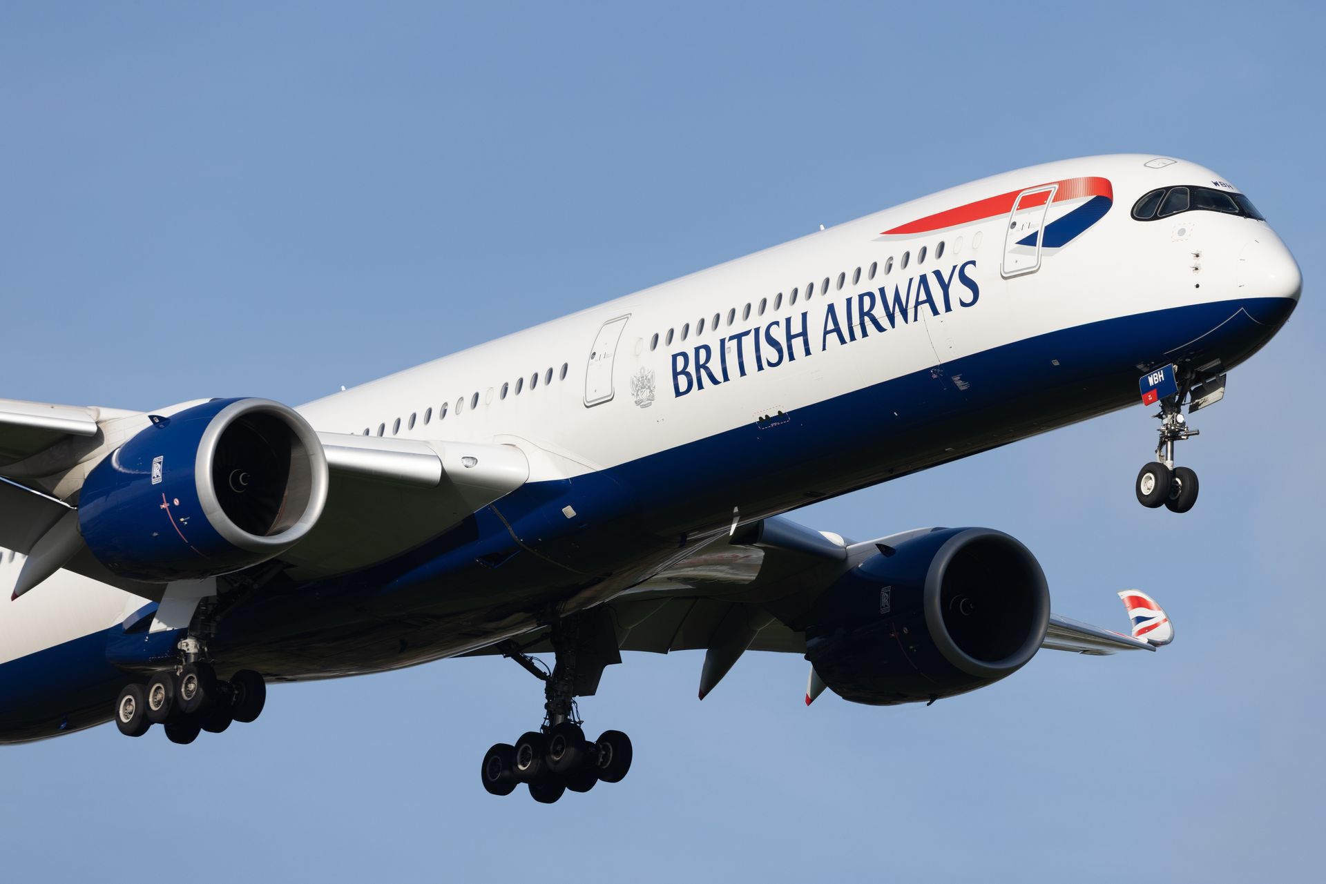 A british airways plane is flying in the sky