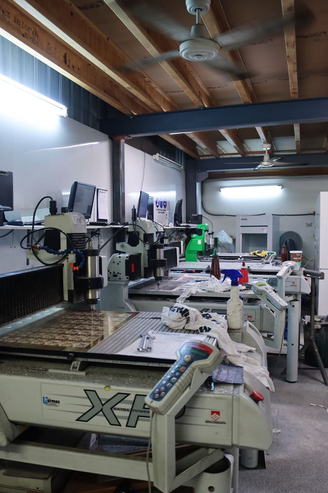A Machine Is Printing a Picture on A Large Piece of Paper — Brookes Engraving & Signs in Unanderra, NSW