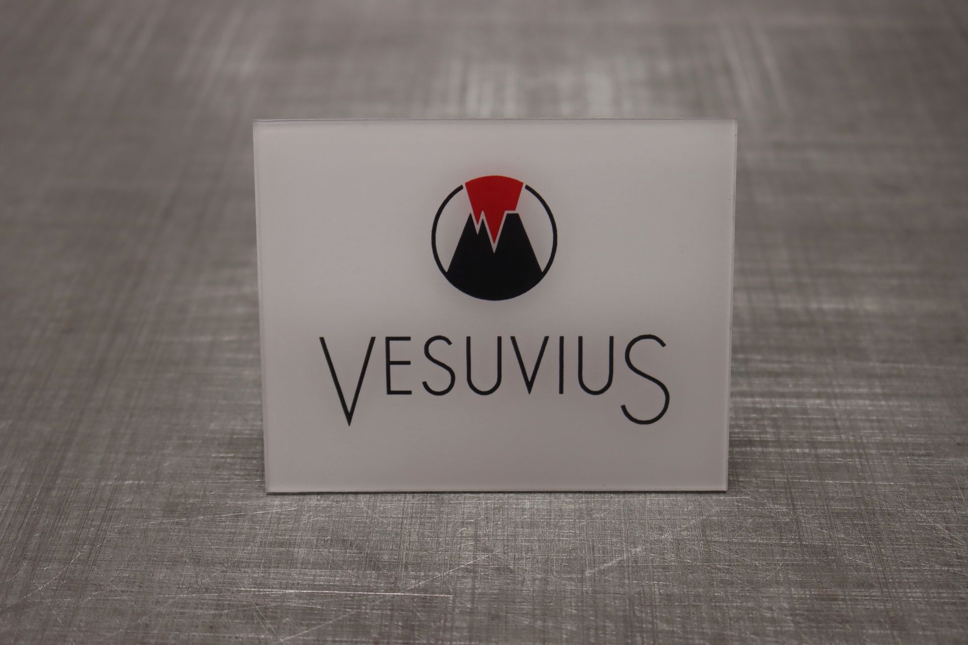 A white sign that says vesuvius on it — Brookes Engraving & Signs in Woonona, NSW