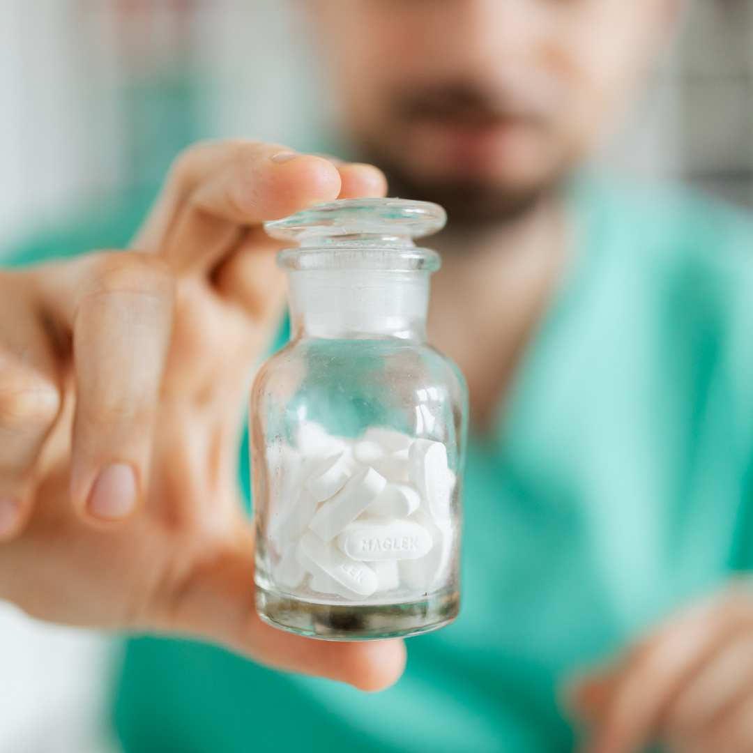 Internal medicine doctor holding patient's free prescription.