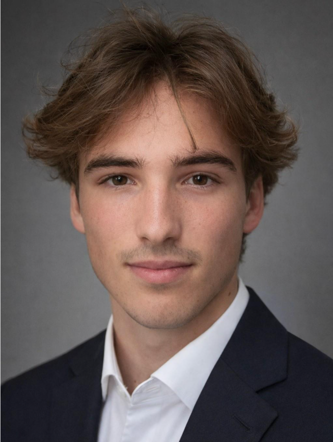 Man wearing a camouflage baseball cap with a brown leather patch smiles outdoors. Green grass and building in the background.