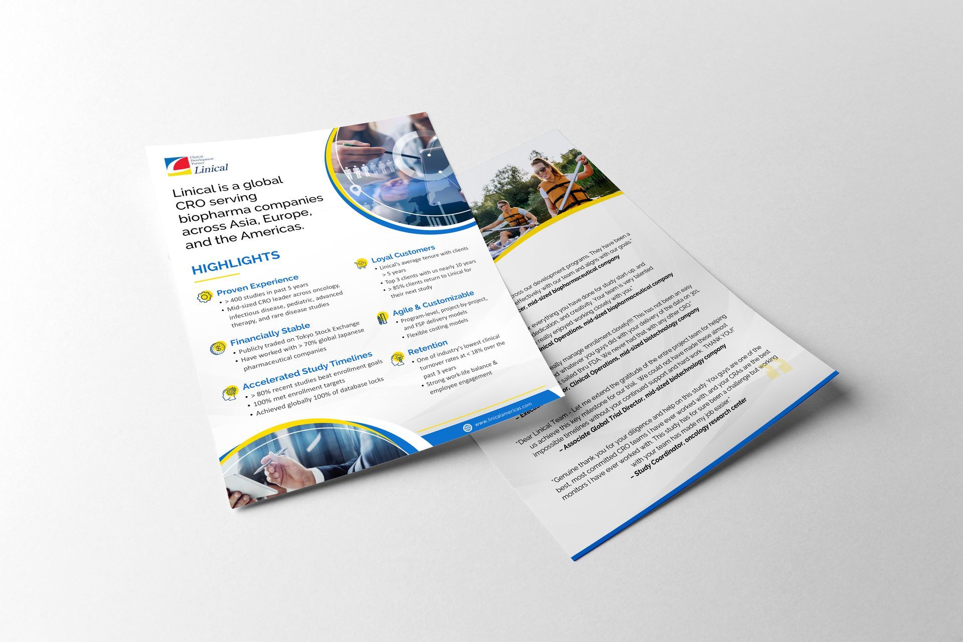 Two brochures are sitting on top of each other on a white surface.