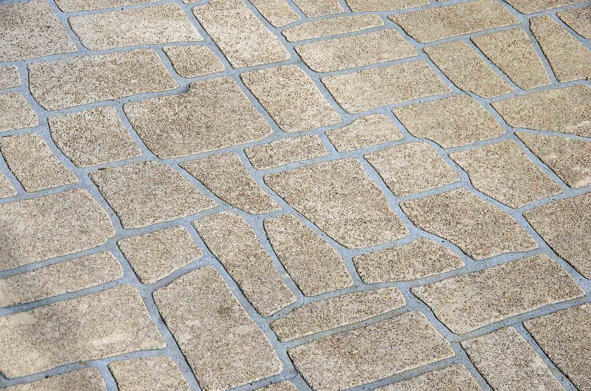 Stencilled Concrete Driveway in a Flagstone Pattern | Townsville, Qld | North Queensland Concrete Solutions