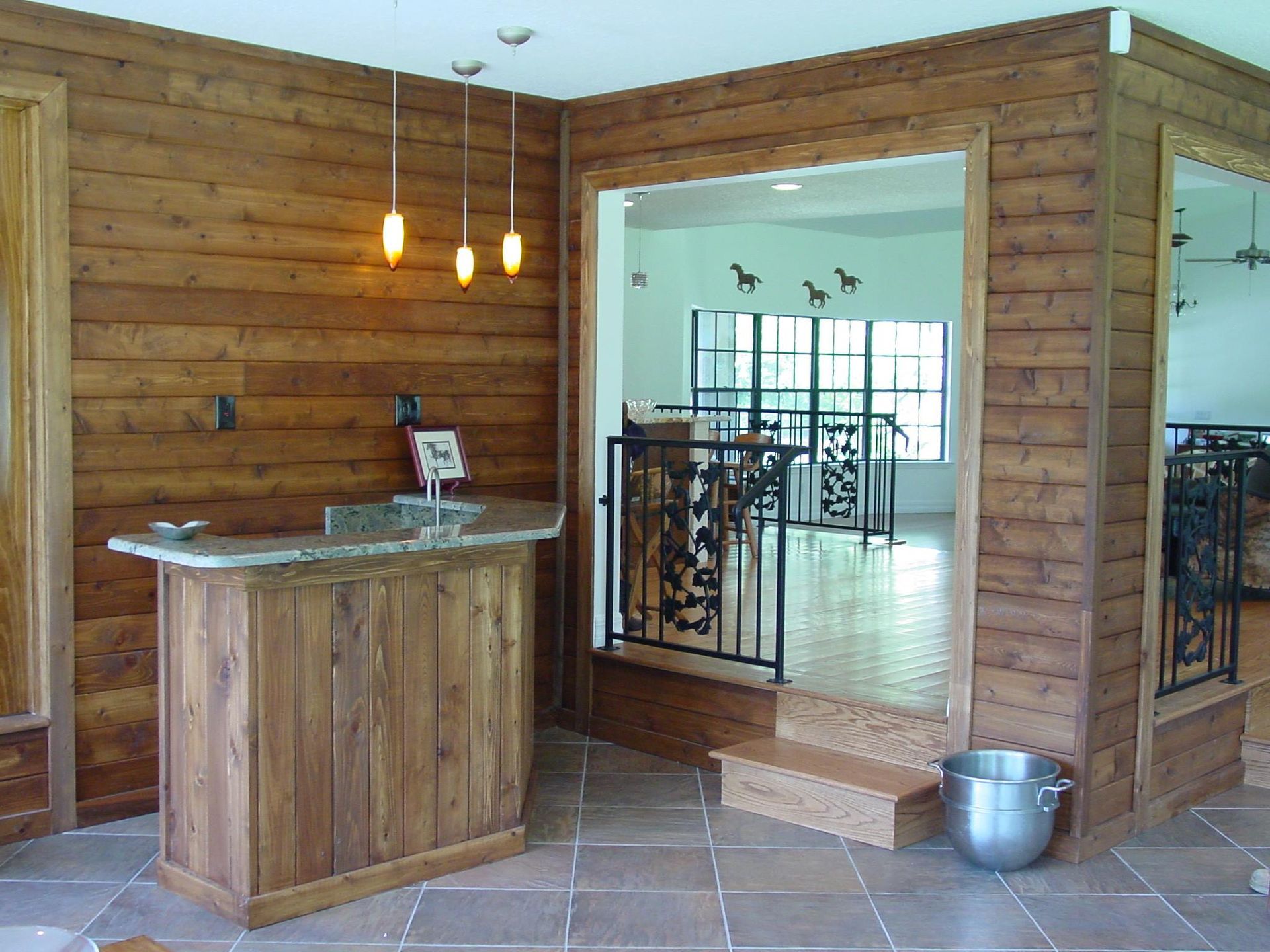 A room with wooden walls and a wooden counter