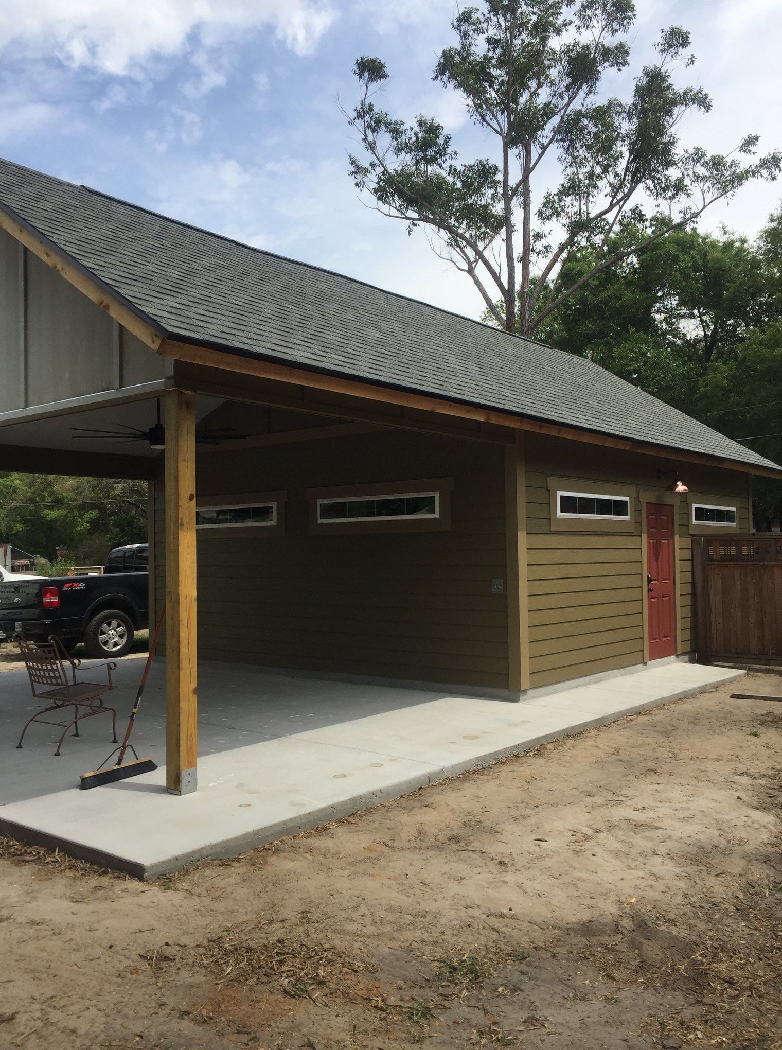A garage with a car parked underneath it