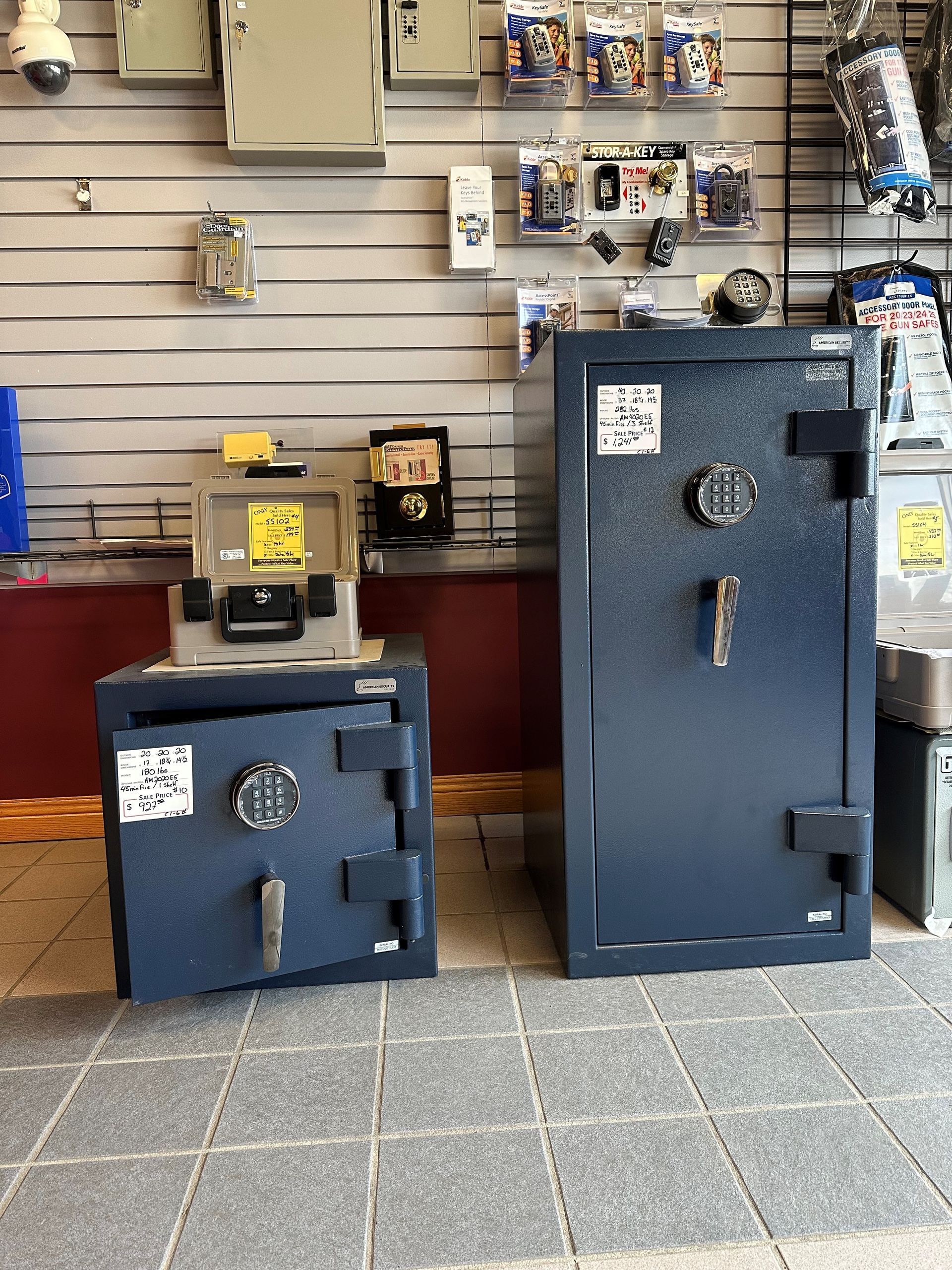 Two safes are sitting next to each other in a store.