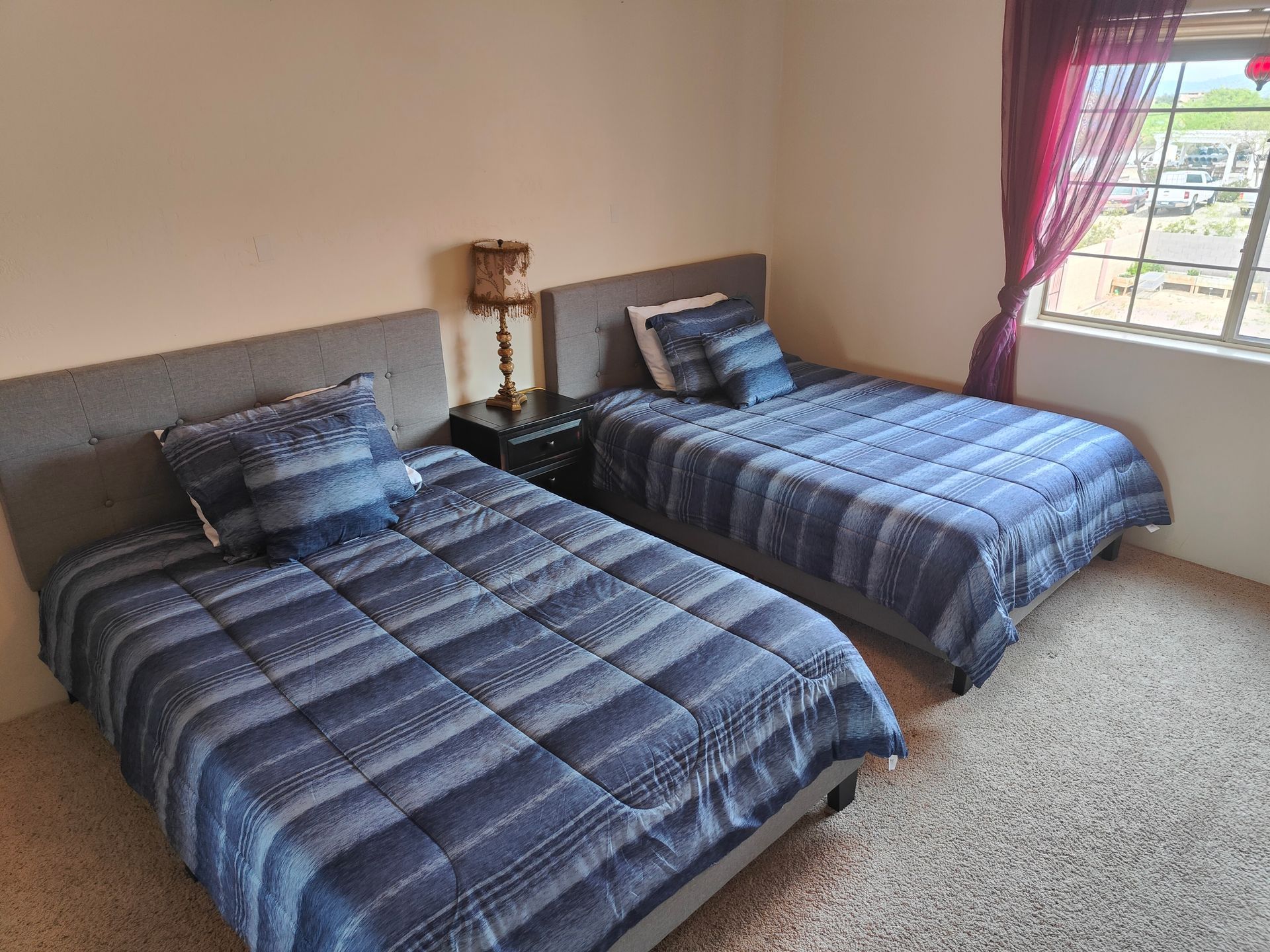 Two Large Blue Beds