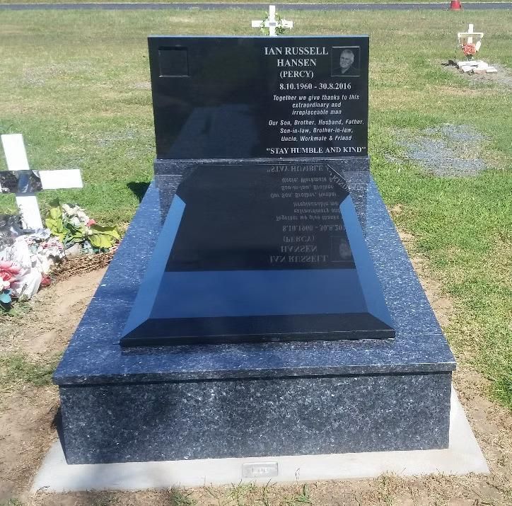 A Black Gravestone With the Name on It — Mackay Monumental Masons In Glenella, QLD