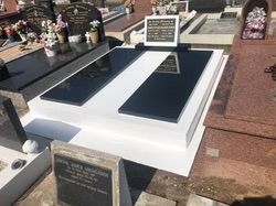 White and Black Tombstone With Two Black Slabs — Mackay Monumental Masons In Glenella, QLD