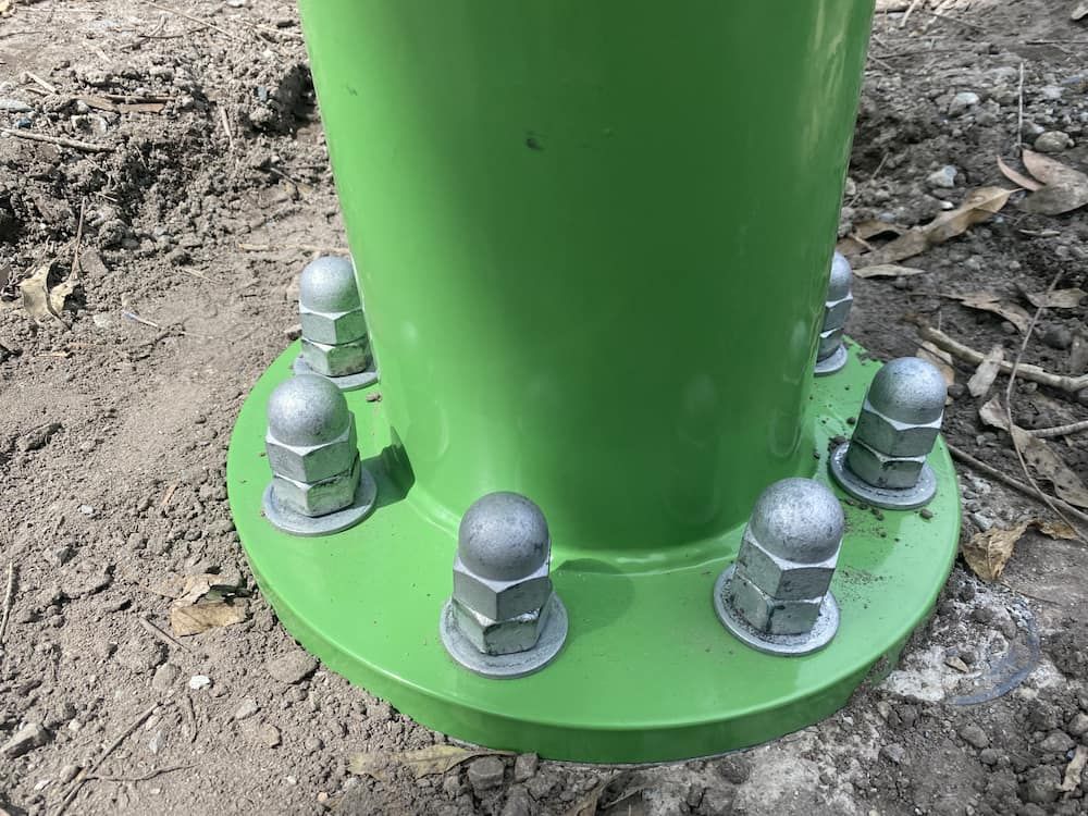 A Green Pole With Nuts And Bolts On It Is Sitting In The Dirt β SPF Shades and Sails in Tweed Heads West, NSW