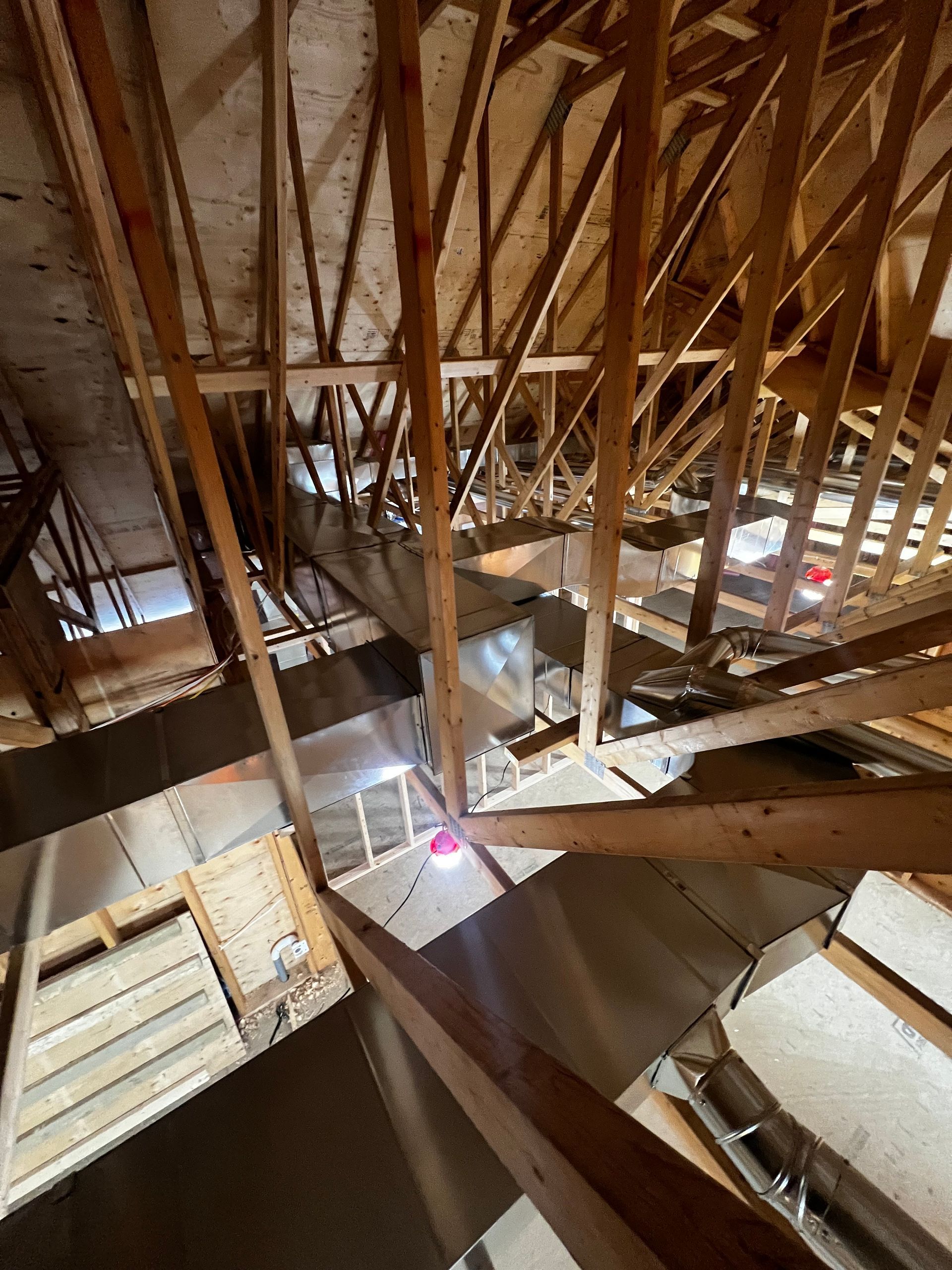 Looking up at the ceiling of a building under construction.