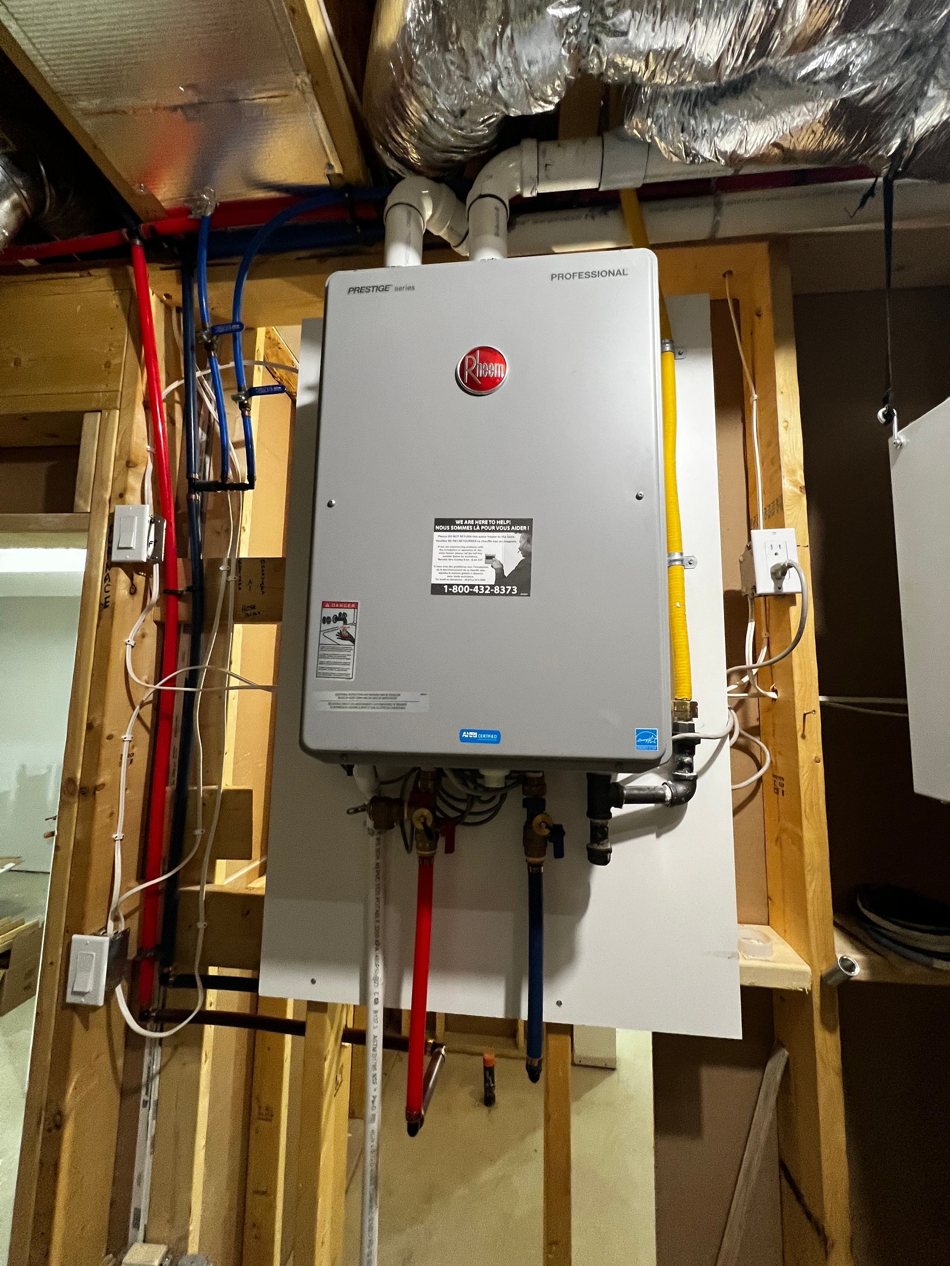 A gray box with a red button on the top of it