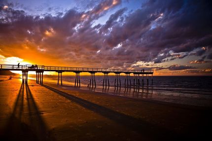 There Is a Pier on The Beach at Sunset  — Cooloola Tile Company in Hervey Bay, QLD