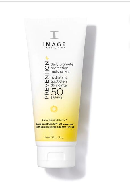 A bottle of image prevention sunscreen with spf 50 on a white background.