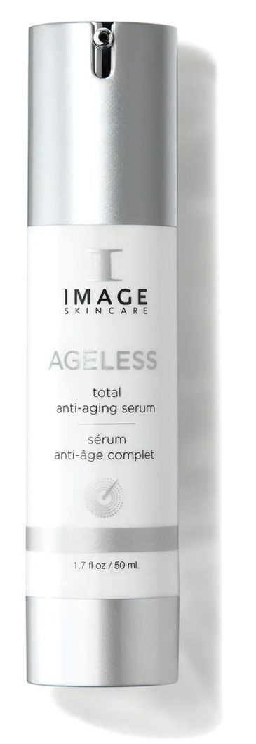 A bottle of image ageless serum is sitting on a white surface.
