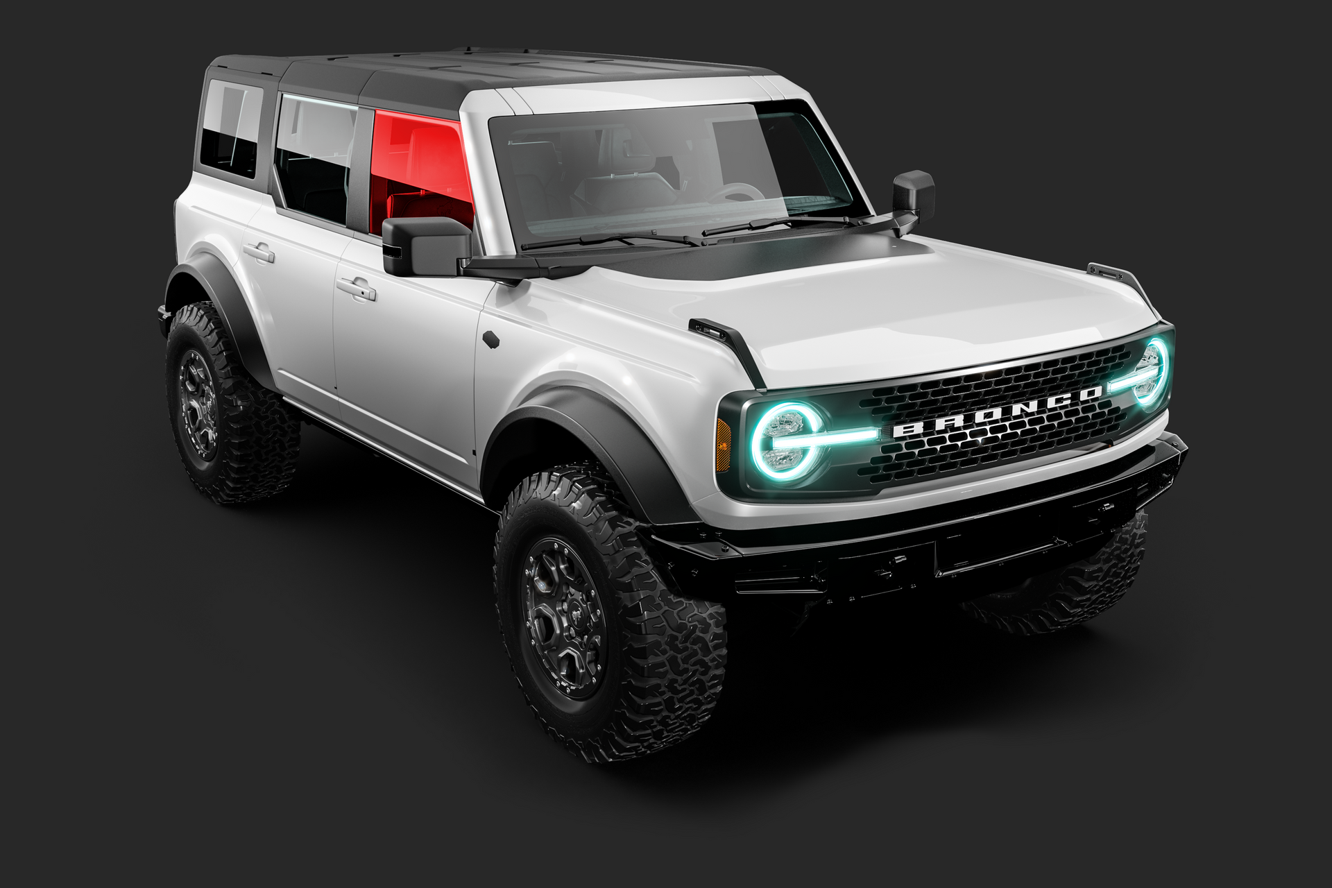 White Ford Bronco SUV, black trim, off-road tires, gray background.