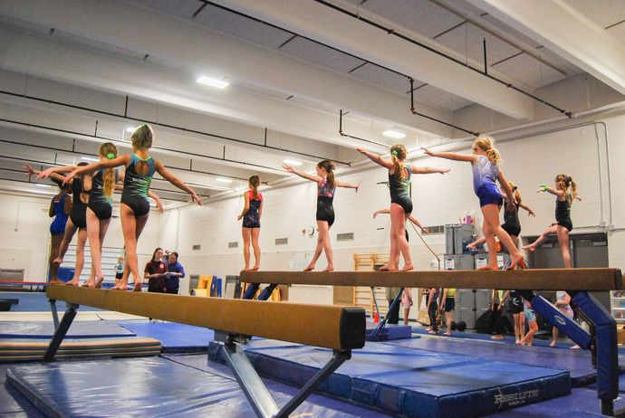 Gymnasts on the beam
