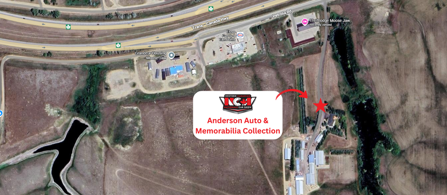 Aerial view of Anderson's Auto & Memorabilia Collections, indicated by a WCN marker and a logo. Nearby is a highway and a body of water.