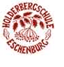Rotes Logo der Holderbergschule Eschenburg mit einer Zeichnung eines Beerenzweigs innerhalb eines kreisförmigen Textrahmens.