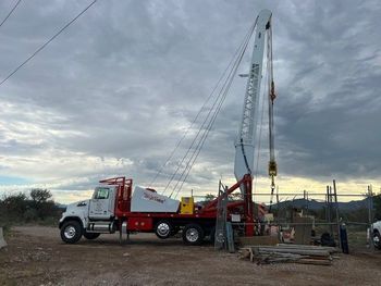 White Truck Installing Pump – Buckeye, AZ – Western Drilling