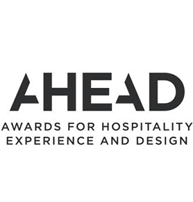 The logo for ahead awards for hospitality experience and design.