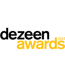 The logo for the dezeen awards 2022 is black and yellow.