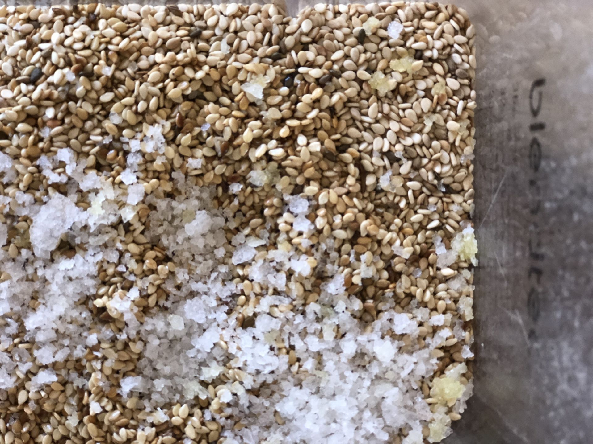 A close up of a pile of grains and salt