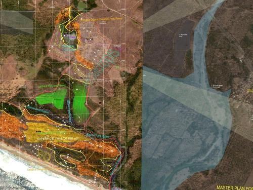 An aerial view of a river and a master plan