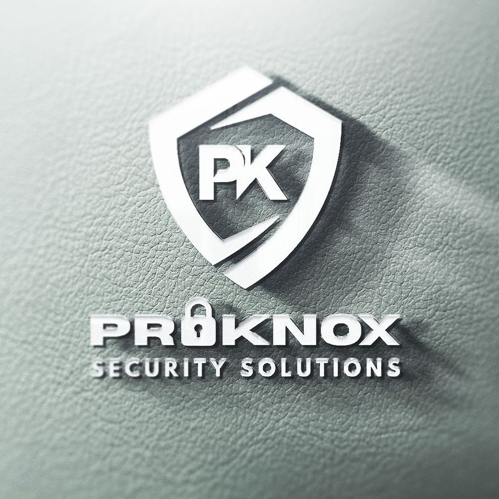 A logo for ProKnox Security Solutions with a shield on a green leather surface.