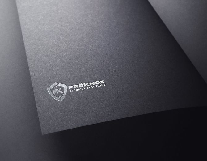 The ProKnox Security Solutions logo embossed on a black folder