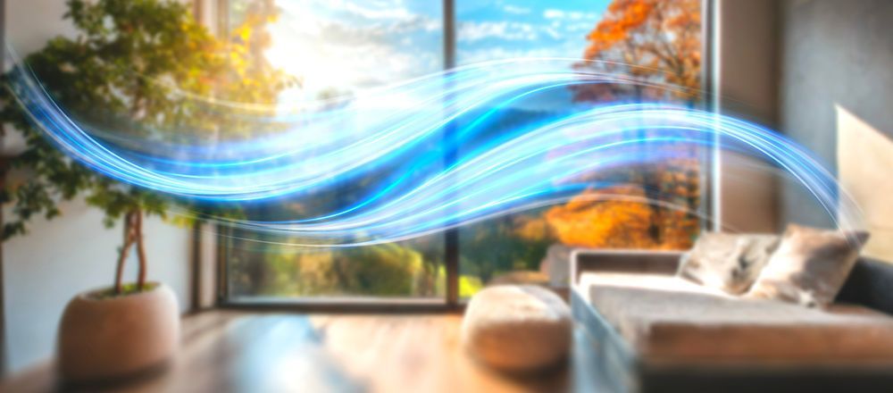 massage at spa A bright living room scene with a large window and blue flowing lines representing air.