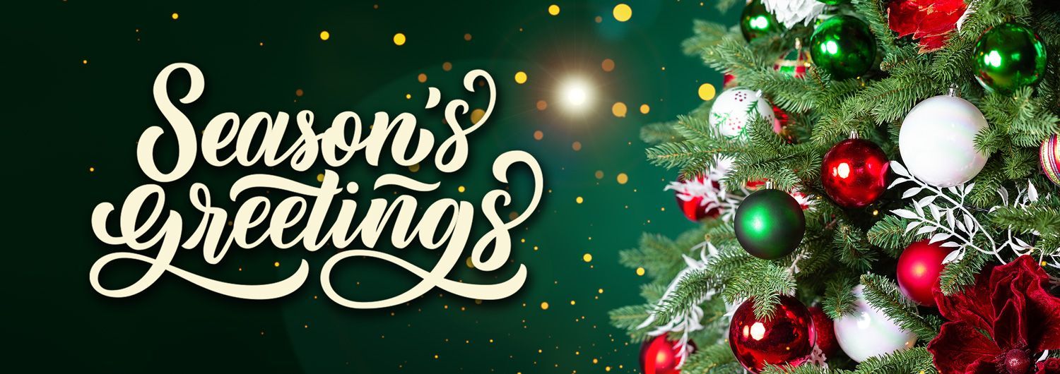 seasons greetings Season's Greetings text on a dark green background with a decorated Christmas tree.