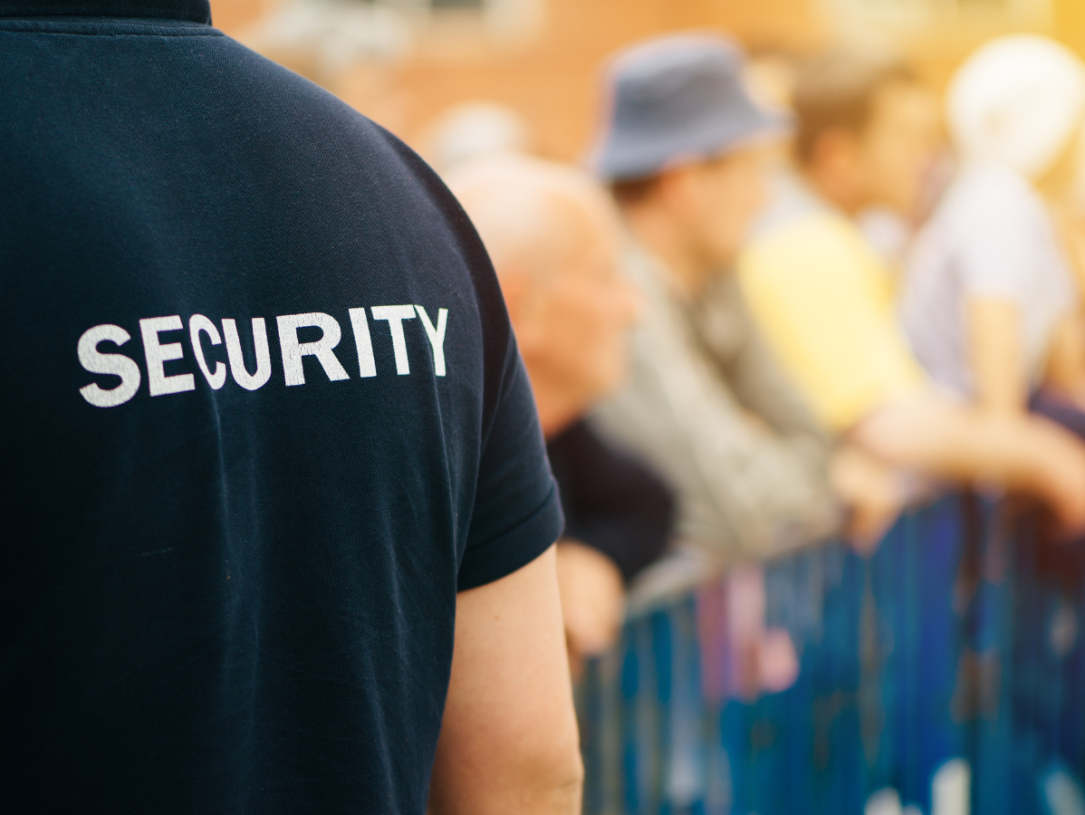 Security guard in black shirt with 