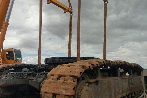 A Large Piece of Equipment Is Being Lifted by A Crane — Linmar Cranes & Haulage in Mt Isa, QLD