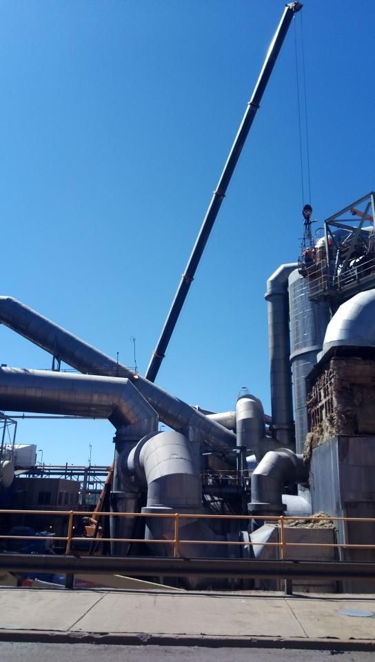 A Large Industrial Plant With a Crane in the Background — Linmar Cranes & Haulage in Kalkadoon, QLD