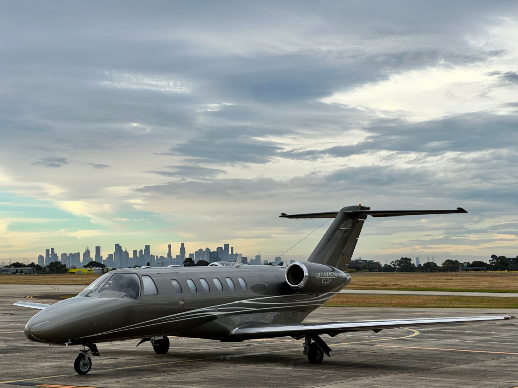 Private jet in Australia with security icons, illustrating the importance of insurance for charter flights